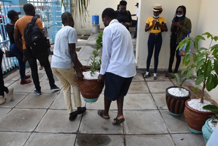 Students decorating the Campus with pot flowers