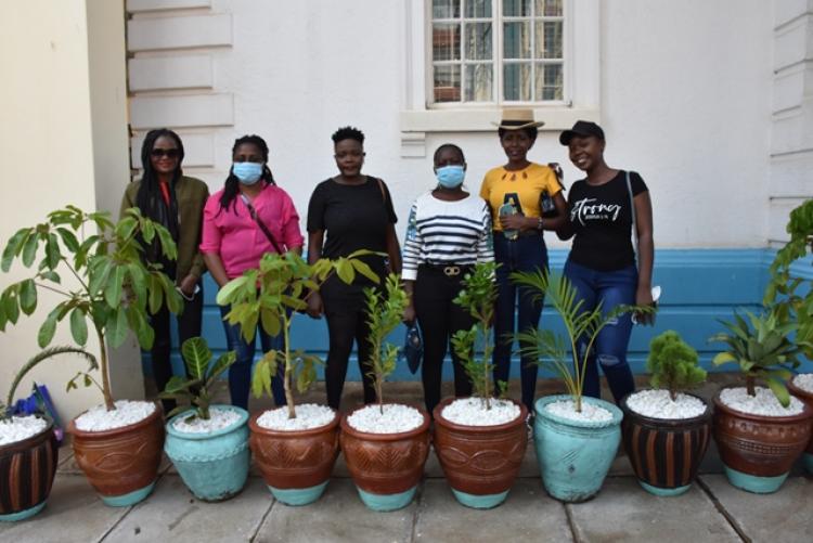 Students decorating the Campus with pot flowers